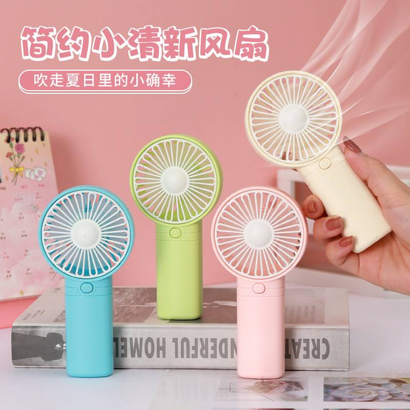 25 new cross-border MiNi fan mini fan handheld small fan dry battery small electric fan logo gift stall