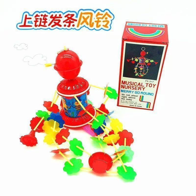 New wind-up bed Bell puzzle spin turn music baby toy wind chime wind-up bed Bell chain string sling wholesale