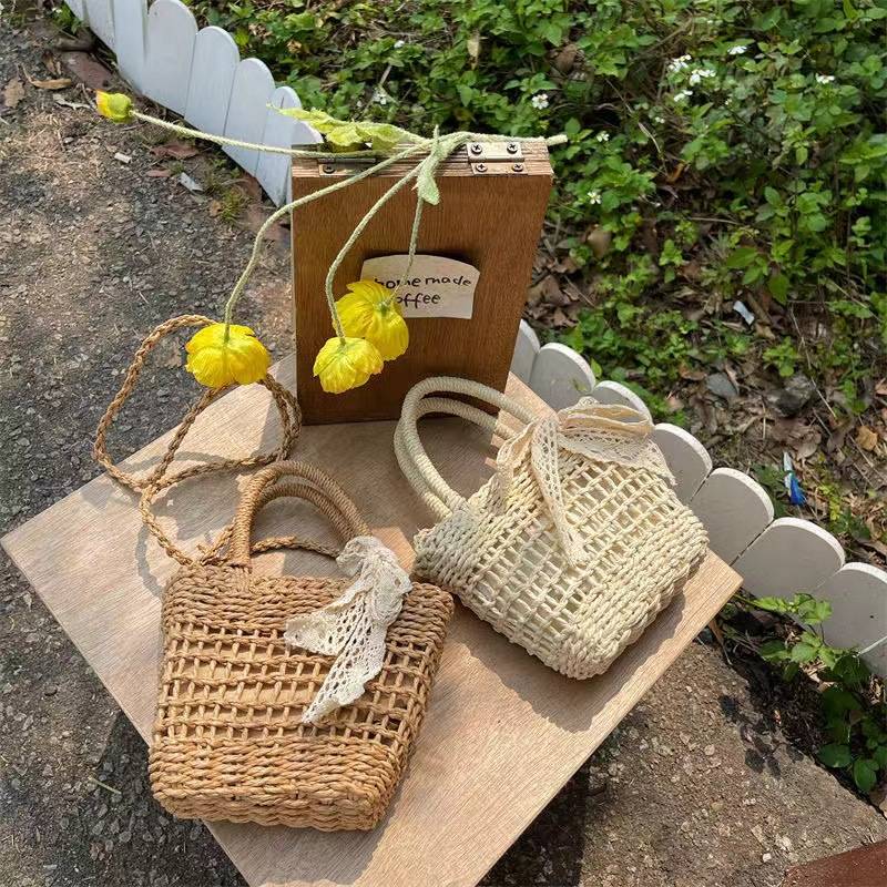 Bow hollow square bag portable crossbody retro casual grass woven bag beach women's bag wholesale