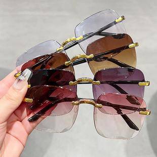 2022 new European and American fashion sunglasses Women's Big face slimming sunglasses frameless trim sunglasses wholesale
