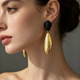 New vintage-style oval black and gold water drop pendant earrings with a high-end feel for women, new Chinese-style bridal earrings
