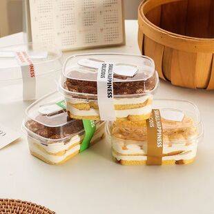 Transparent box with high lid and spoon, layered fruit soy milk cake, popular wood bran cake, baked fruit salad, disposable packaging box