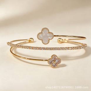 Luxurious copper-inlaid zircon four-leaf clover open bracelet with a high-end, niche design, adjustable fashion wristband for women