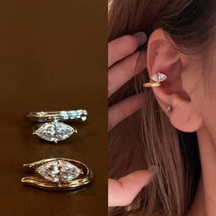 Minimalist, understated, light-luxury design with gold marquise zirconia ear cuffs, high-end fashion and elegant stud earrings