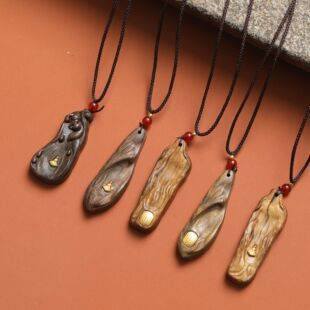 Factory Direct Sale of Carved Agarwood Pendant with Five Buddha Figures, a Popular Item for Resale