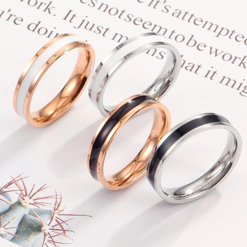 Douyin explosion Japan and South Korea new simple black and white rubber ring lovers rose gold titanium steel ring female jewelry wholesale