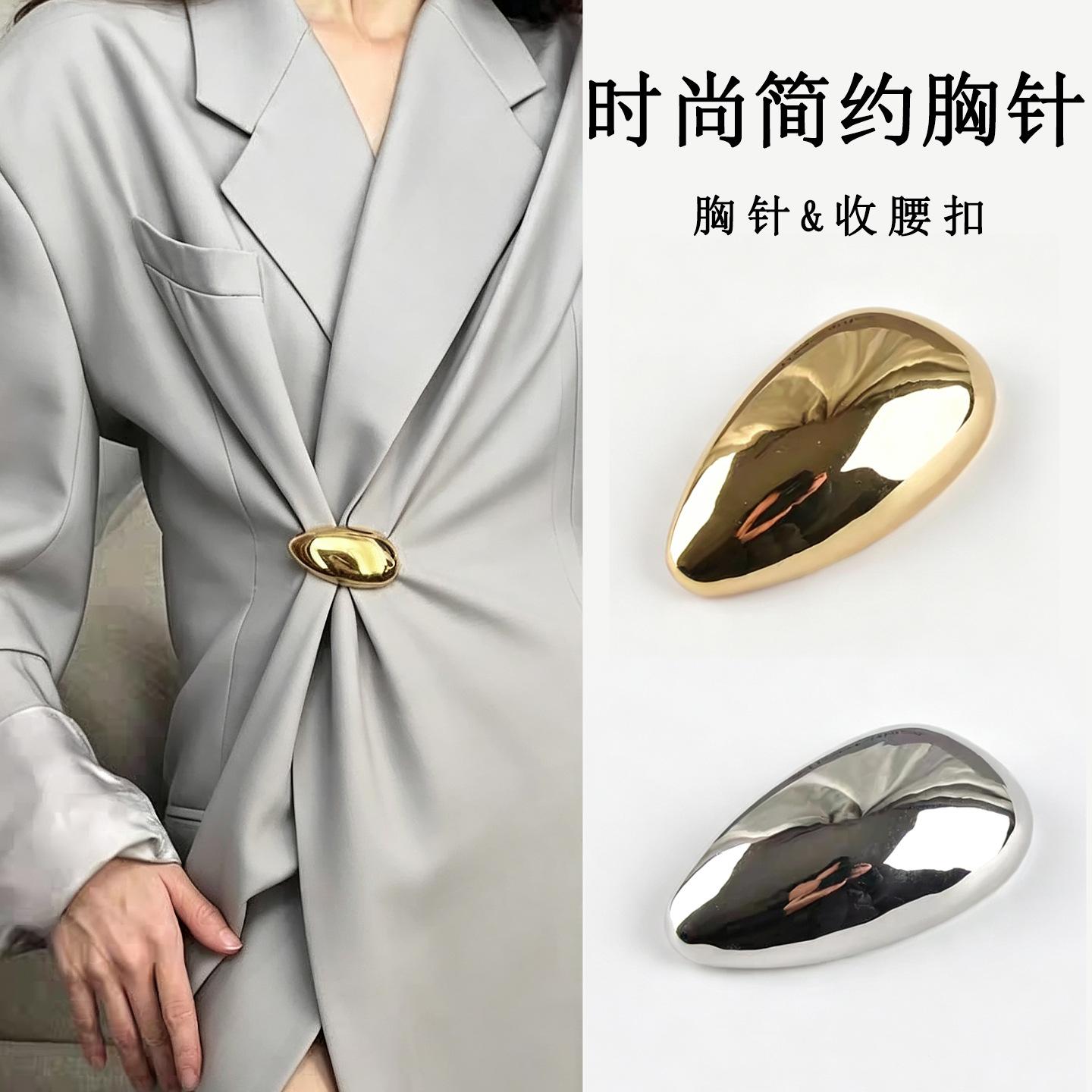 Minimalist design metal glossy brooch with waist-cinching buckle, adds a stylish and sophisticated touch to blazers and sweaters