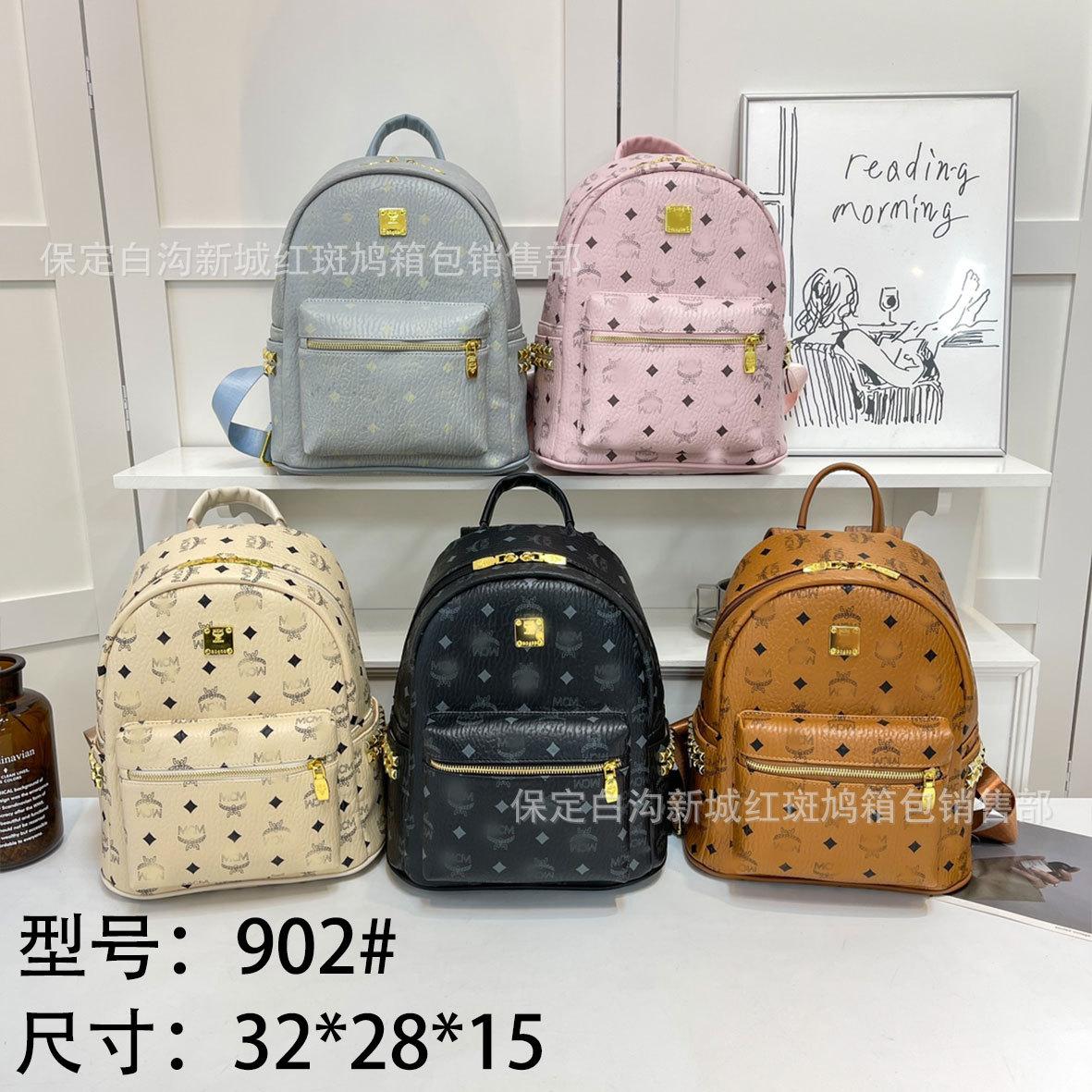 MC classic printed pattern backpack, perfect for the back-to-school season, with rivet detailing, unisex design, suitable for cross-border travel and as a student backpack