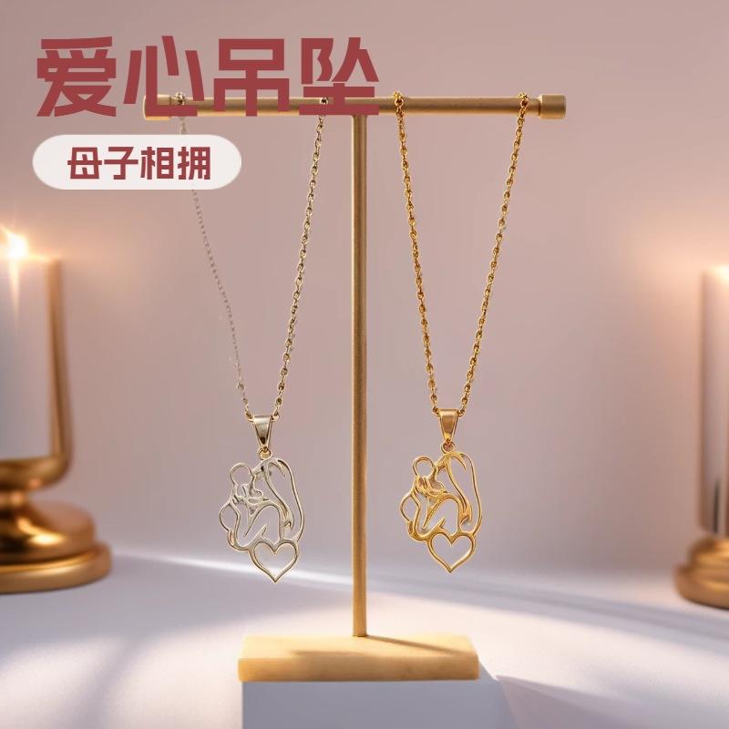 Titanium Steel Mother-Son Necklace with Hollow Parent-Child Embrace Heart Pendant, Light Luxury Niche Simple Versatile Accessory, Factory Wholesale
