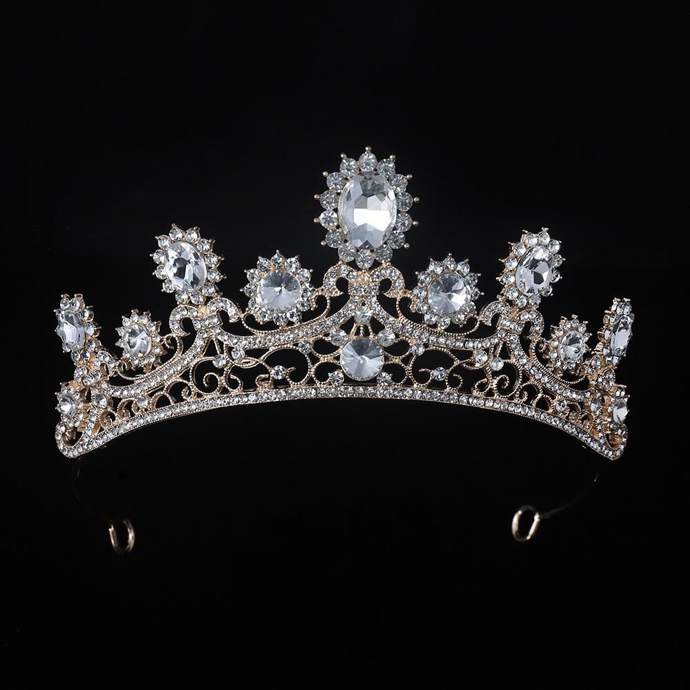 Gold European-style vintage crown, bridal headpiece with intricate hollowed-out patterns, suitable for wedding dresses, evening gowns, and wedding attire