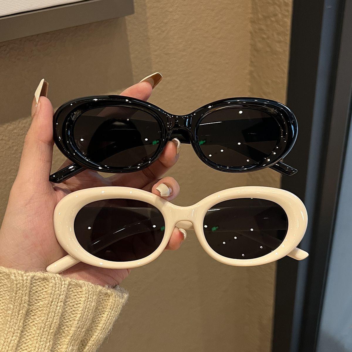 Oval white frame sunglasses European and American concave sunglasses Women's Big Face cat eye sun protection high-grade ins slimming