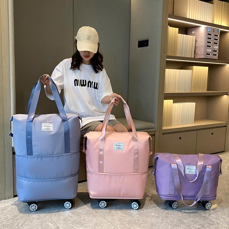 Travel bag large capacity universal wheel student business trip waiting for production storage bag waterproof dry and wet separation expandable luggage bag