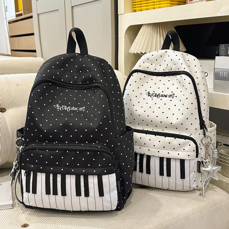 Japanese-style ins piano pattern backpack for female middle and high school students, versatile and cute, high-appearance backpack for college students