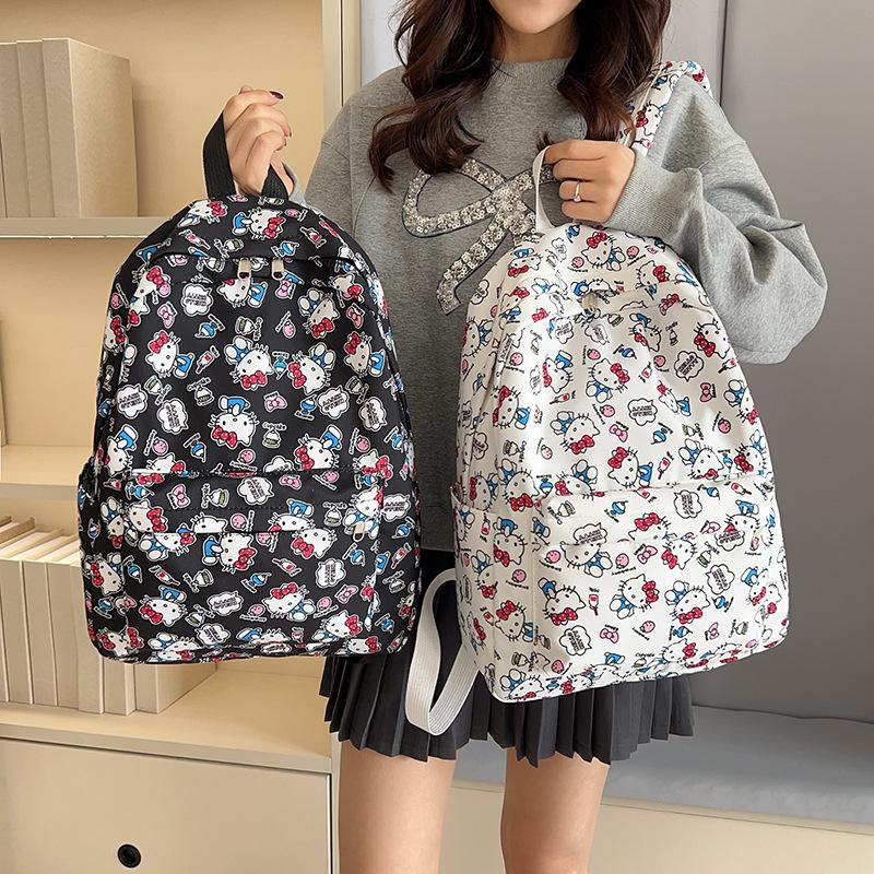 New large-capacity schoolbag small junior high school student college student backpack women's cute Hello Kitty high-value wholesale