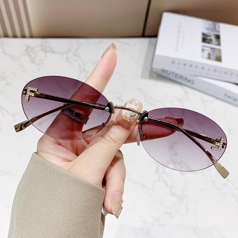 2025 new frameless sunglasses letter F diamond oval frame fashion sunglasses European and American trend small frame decorative