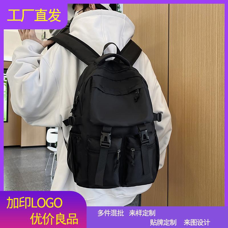 Trendy pure black backpack with multiple pockets and large capacity, casual double shoulder bag, 2026 new model for middle and high school students, both male and female