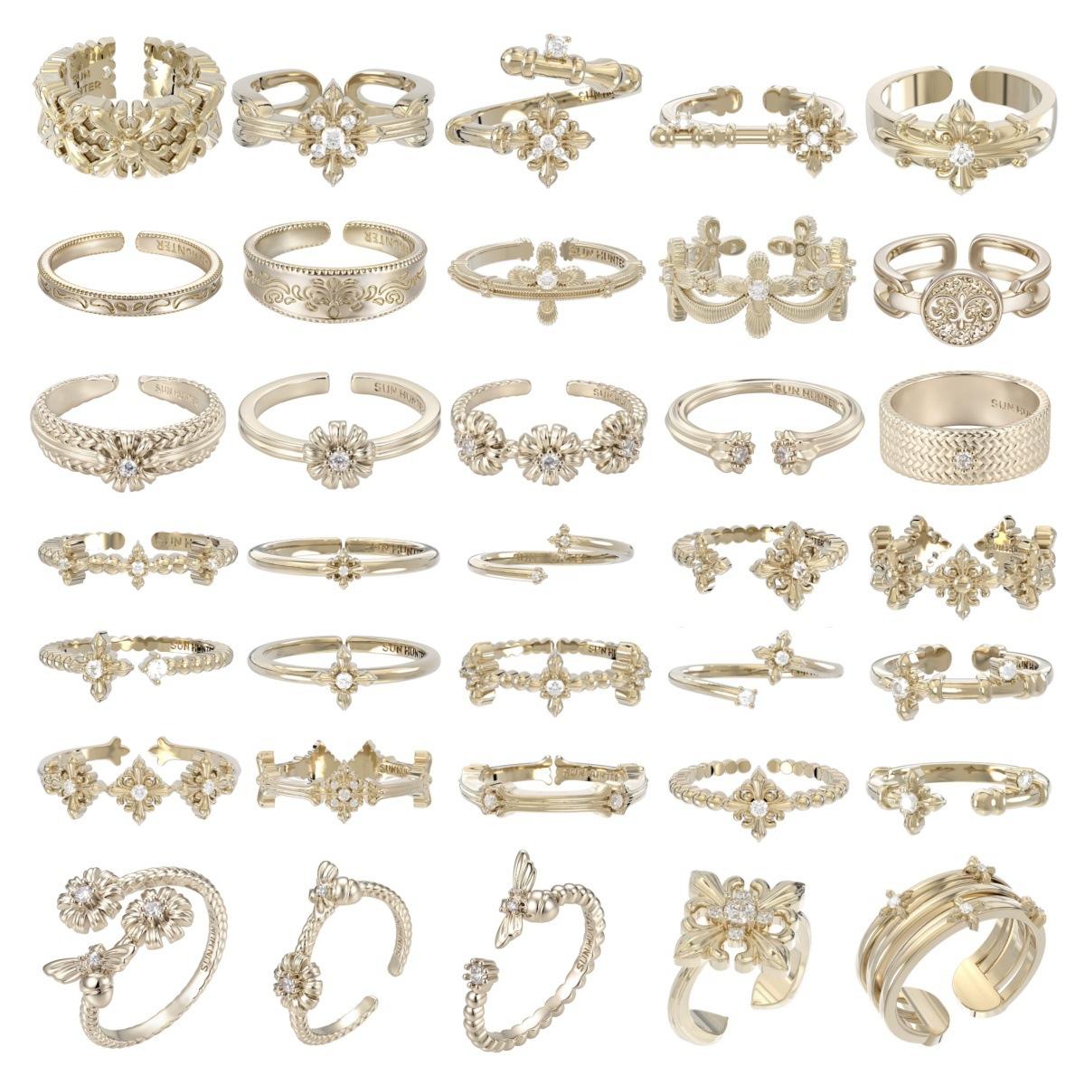 Three horizontal designs of the same style: iris flower ring, light titanium lace hollow cross, and Maillard-toned luxury jewelry, available for wholesale