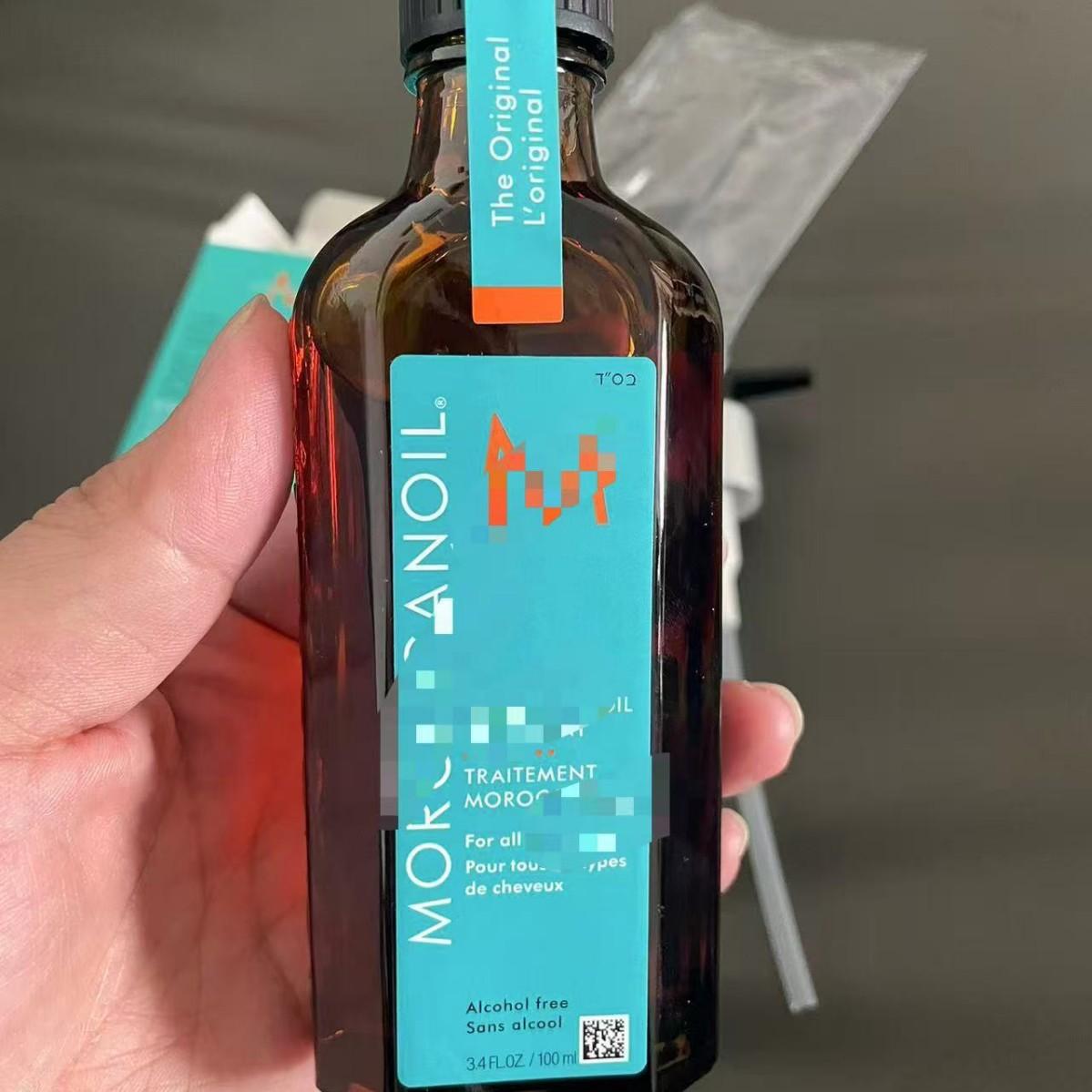 Cross-border Moroccan hair oil, nourishing and repairing essential oil for dry hair, anti-frizz care, smoothing for permed and dyed hair, 100ml