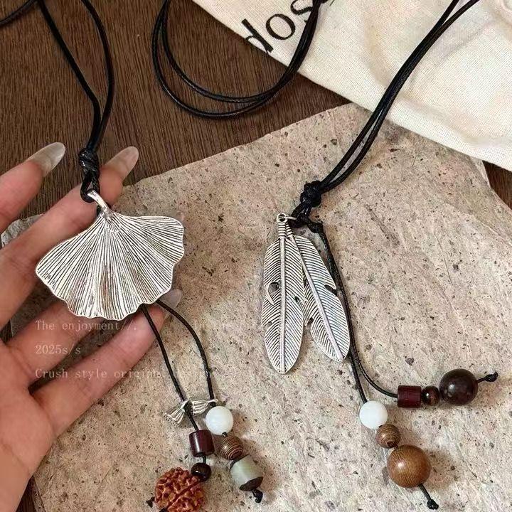 New Chinese Style Ginkgo Feather Tassel Necklace for Women 2025 New Retro Medieval Wear Matchinging Long Necklace