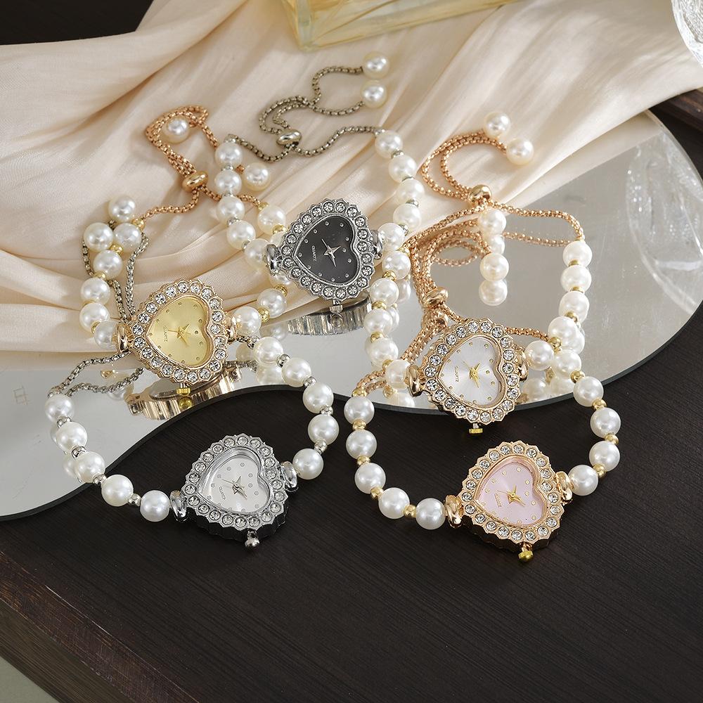 Female foreign trade student watch love-shaped diamond-encrusted academic style fashion temperament decorative pearl lazy pull bracelet watch