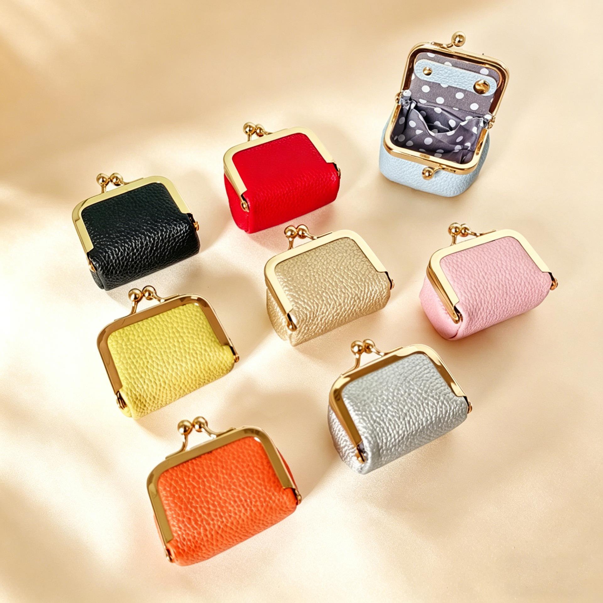 New compact jewelry organizer with a stylish design, perfect for storing earrings, necklaces, rings, and other small accessories; also functions as a mini coin purse