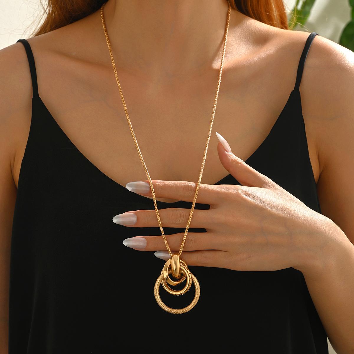 European and American cross-border vintage metal ring pendant necklace for women, long style, simple and elegant, versatile, wholesale foreign trade supply
