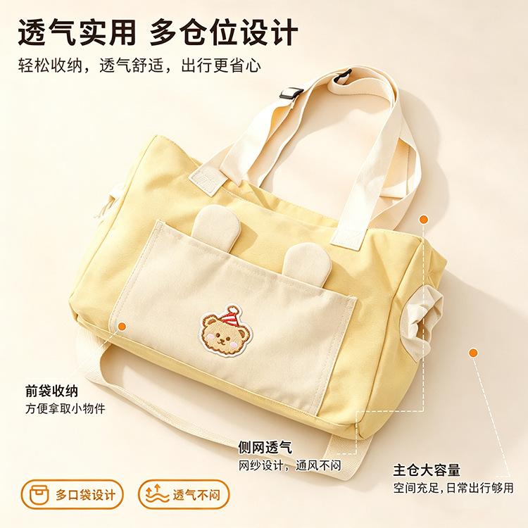 Portable pet carrier for cats and small dogs, breathable canvas single-shoulder backpack with an open head area, a must-have accessory for taking your cat or dog out