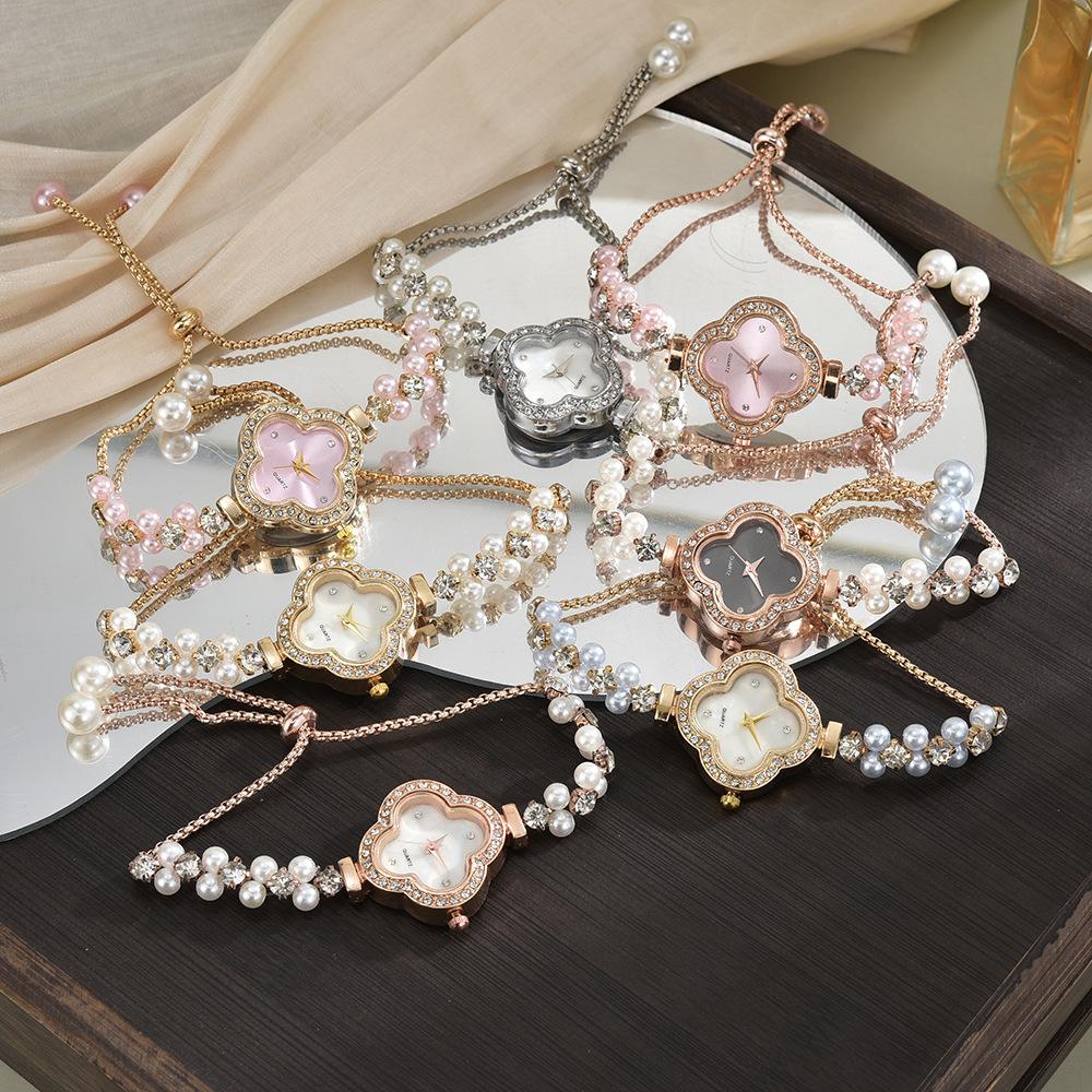 Cross-Border Female Student Watch Four-Leaf Clover Diamond College Style Dial Decorated with Pearls Lazy Pull Bracelet Watch