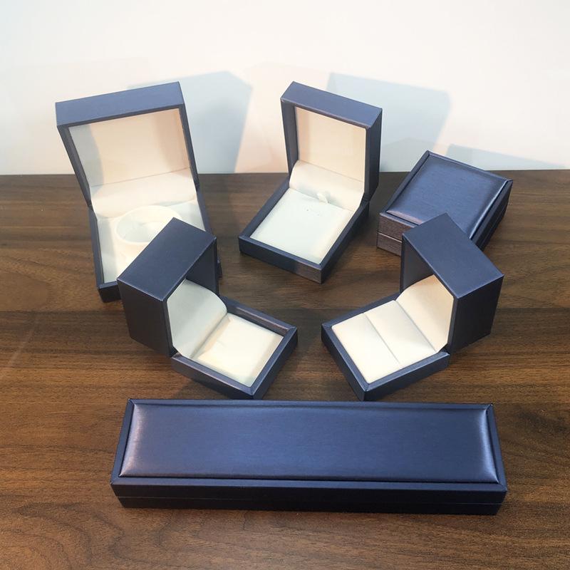 Brushed PU leather blue jewelry box with white interior for packaging accessories, ring, earring, pendant, bracelet box factory