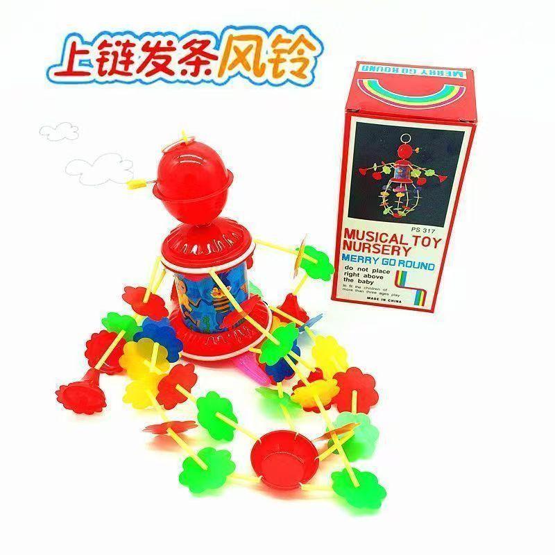New wind-up bed Bell puzzle spin turn music baby toy wind chime wind-up bed Bell chain string sling wholesale