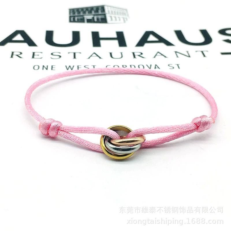 Cross-border big-name peripheral three-color circle woven lucky hand rope high-level temperament ins wind band word bracelet wholesale