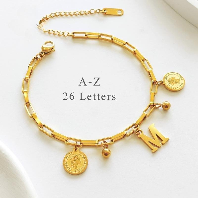 Cross-border popular fashion round pendant 26-letter titanium steel bracelet for women, niche light luxury high-end stainless steel jewelry wholesale